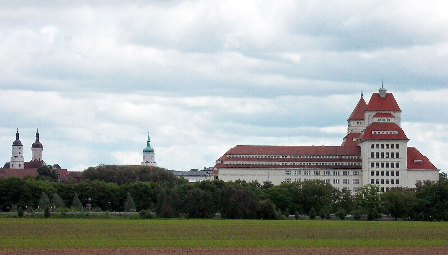Stadtansicht von Wurzen mit Kirchtürmen und historischen Mühlenwerken